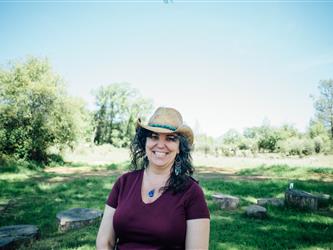 A woman smiling